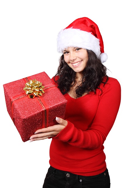 http://pixabay.com/en/christmas-claus-cute-gift-girl-15651/